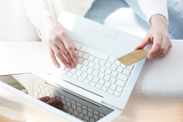 Top view of a laptop and credit card ready for an online store purchase